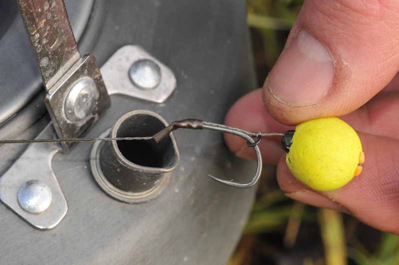 12 Carefully position and then pinch the shot so that it sits inside the bottom of the bait.