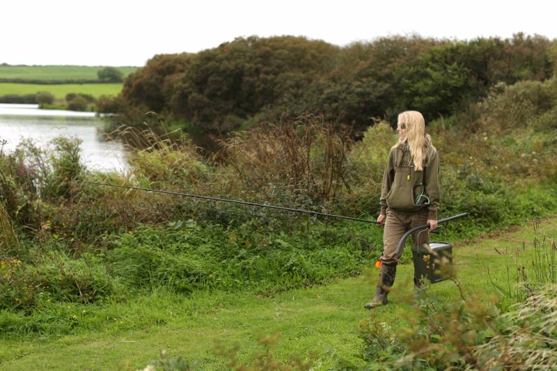 Walking the banks, looking for fish, scouting areas and applying some bait is all part of big water carping