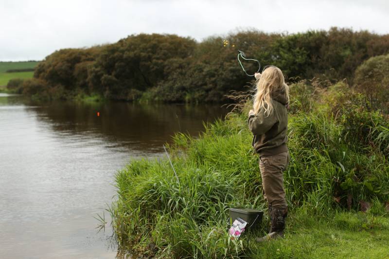 A few boilies here and there, gaining the confidence of the carp