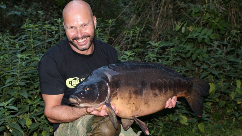 When you are getting the baiting situation right they can come like busses this 32lb mirror found the net shortly after the Woodcarving