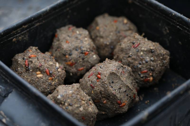 Wet, heavy balls of groundbait – perfect for carrying bait down to the bottom quickly in running water