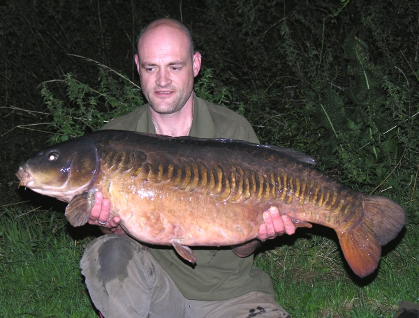 A beauty from the margins on a bottom bait