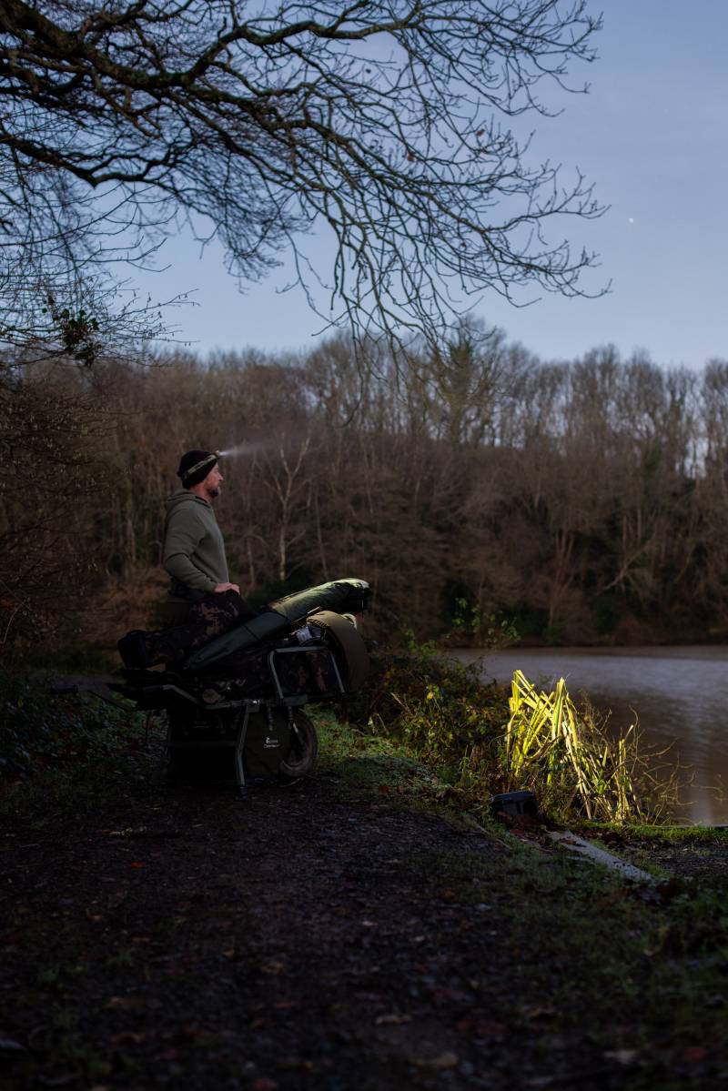Listening for carp while waiting for a little more light.