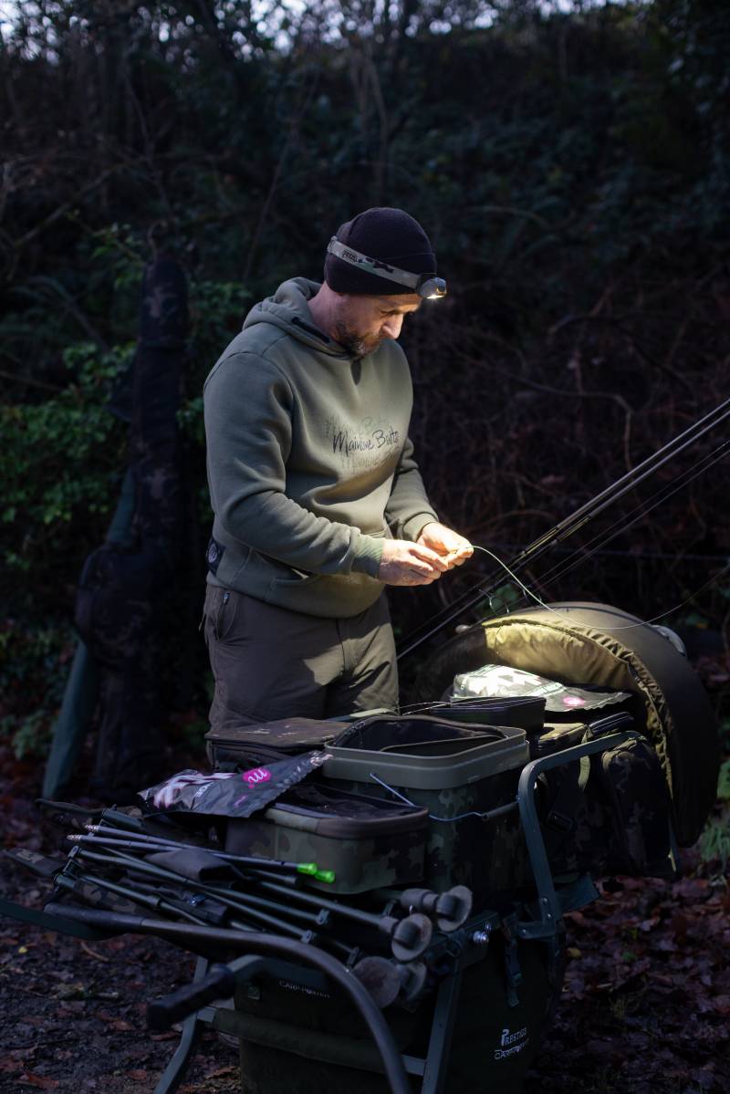 Prepping the rods with a plan to fish from the barrow for the day.