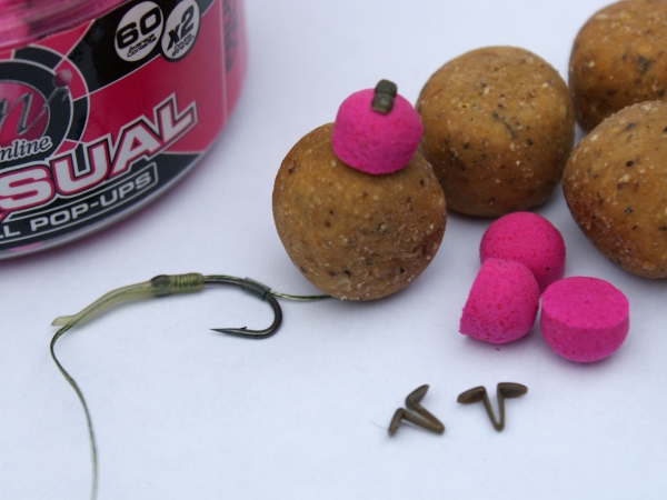 Dumbells cut in half are perfect for tipping regular boilies with some colour, a different flavour and buoyancy.