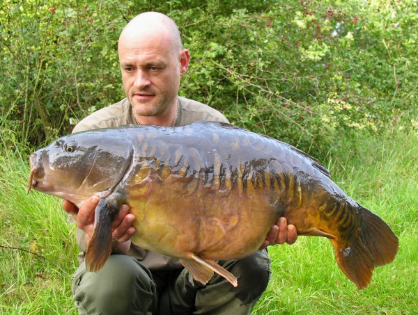 Out in the boat again to land this 29lb 2oz mirror!