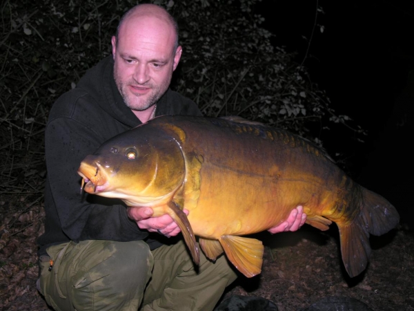 A lovely old mirror in its winter suit