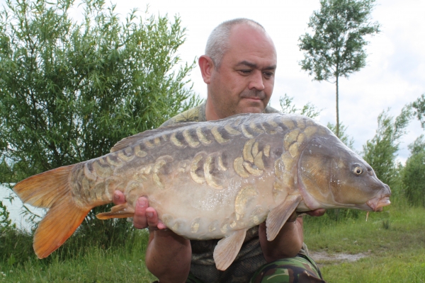 Another Zig victim - 15lb heavily scaled mirror!